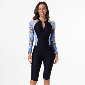 Close-up of long sleeve floral print sleeves and front zipper of the rash guard