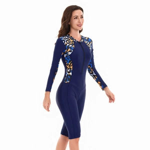 Close-up of women's long sleeve surfing swimsuit with front zipper and leopard print side