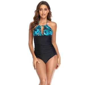 Chic one-piece swimsuit with tropical floral print and tummy control design for women