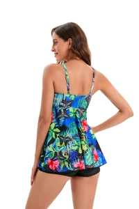 Back view of butterfly floral tankini top with adjustable straps and black swim shorts