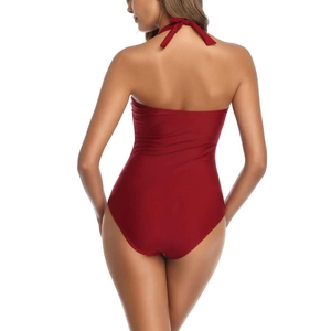 Back view of wine red halter neck one-piece swimsuit with backless design and slim fit