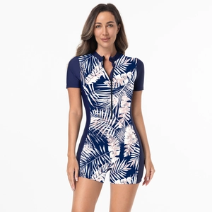 Women's short sleeve one-piece surfing swimsuit with tropical palm leaf print in deep blue