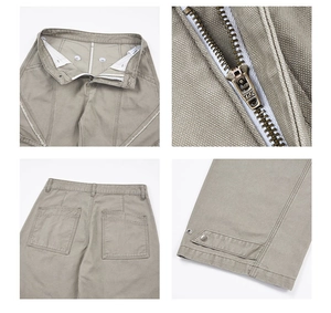 Vue détaillée du pantalon cargo kaki avec fermeture éclair YKK et texture en coton épais