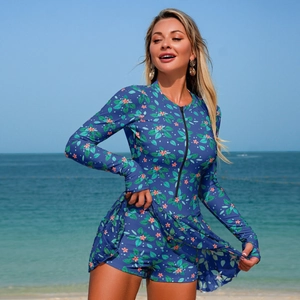 Detail of long sleeve floral surf swimsuit with front zipper and skirted bottom