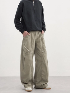 Pantalon cargo vert olive de style streetwear avec jambes larges et coutures usées