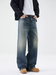 Jeans ampi da uomo stile rétro cleanfit blu lavato con dettagli vintage usurati