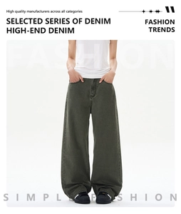 Detail of high-end vintage wide-leg cotton denim pants in olive grey street style