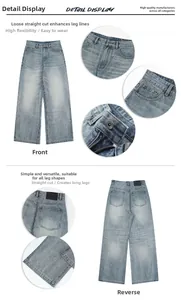 Detailed views of washed blue gradient denim jeans showing metal zipper and leather patch
