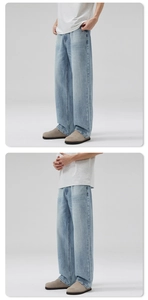 Vue détaillée du denim délavé bleu clair et des coutures de qualité du jean large