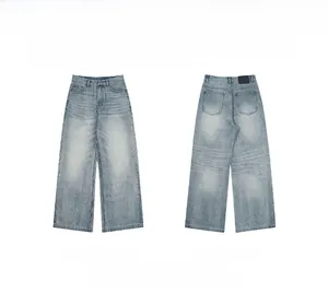 Detail view showing front and back of light blue gradient wash wide leg denim jeans