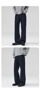 Close-up of deep blue straight-leg jeans with vintage contrast stitching for men