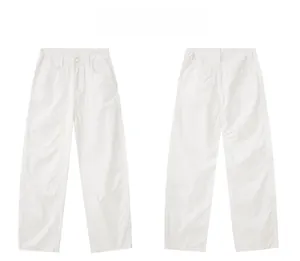 Detailed front and back view of white high street trousers showing pockets and stitching