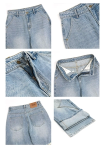 Detail view of light blue straight denim jeans with high waist cut and quality stitching