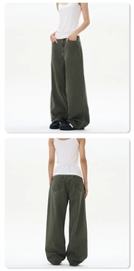 Detailed views of vintage olive green wide-leg denim jeans with a high-waisted fit