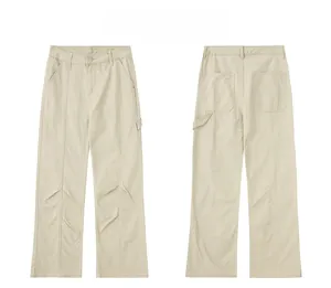 Detail display of khaki utility pants with hammer loop and reinforced back pockets