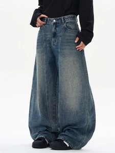 Jean denim délavé bleu clair pour homme avec coupe large et coutures apparentes