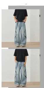 Model display of baggy light blue jeans with star-shaped cutouts and metal waist chain