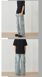 Detail view of light blue cargo jeans with multi-pocket design and wide-leg street style fit