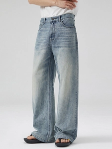 Vintage washed light blue high-waist wide-leg denim jeans in a straight fit silhouette