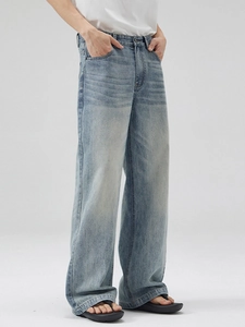 Men's loose straight-leg denim jeans in washed light blue with a vintage streetwear fit
