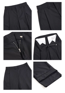 Vues détaillées du pantalon noir avec fermeture éclair, coutures et finitions de taille