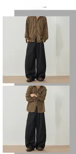 Detail view of brown striped shirt paired with black wide-leg trousers for casual style