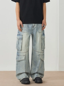 Men's light blue washed vintage cargo jeans with wide leg fit and multiple pockets