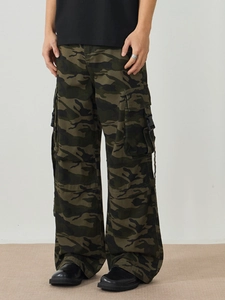 Men's camouflage cargo pants in woodland print with large side buckle pockets