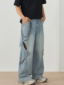 Men's light blue wide-leg jeans with star cut-outs and metal chain accessory