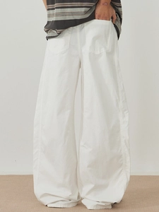 Minimalist oversized white wide-leg trousers in cotton twill for men and women