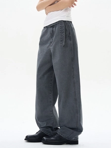 Unisex grey loose-fit straight denim jeans with a stonewashed finish and long waist belt