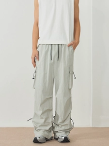 Light gray loose fit quick-dry cargo pants with adjustable drawstring hem and side pockets