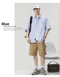 Detail view of men's blue striped short sleeve shirt paired with casual khaki cargo shorts