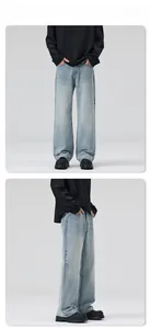 Détails du délavage bleu clair et de la coupe droite de ce jean denim au style vintage