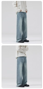 Detail der hellblauen Straight-Leg-Denim-Jeans mit Vintage-Waschung und lockerer Passform