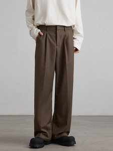 Men's dark brown straight-leg trousers with classic pleats and high-quality drape