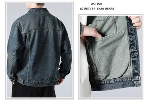 Detail view of vintage washed denim jacket showing back design and large inner pockets