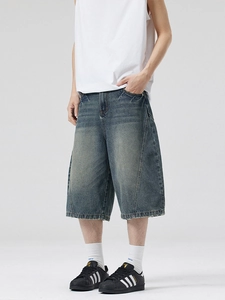Men's retro washed blue denim shorts with wide-leg cut and vintage stitching detail