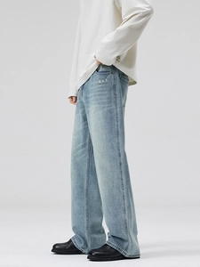 Men's light blue washed high street straight jeans with vintage worn details and loose fit