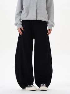 Détail du pantalon large noir vintage américain avec silhouette coupe cleanfit