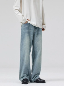 Light blue wide-leg jeans with vintage wash and loose fit style for men and women