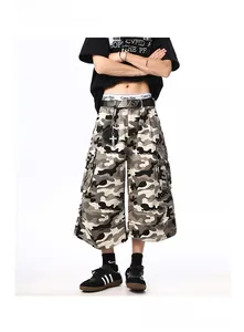 Detail of camouflage cargo shorts with multi-pockets and cross pendant street style
