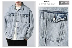 Detailed close-up of light blue vintage washed denim jacket with metal buttons and pockets