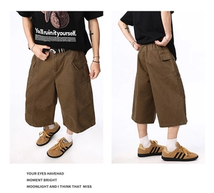 Front and back detail of men's brown cargo shorts with utility pockets and loose fit