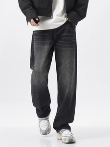 Mens vintage washed black loose fit straight leg denim jeans with aesthetic street style look