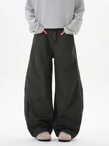 Vue détaillée du pantalon banane vintage gris vert foncé à jambes larges et coutures