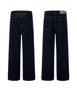 Front and back view of dark blue high-waisted wide-leg denim jeans with leather patch