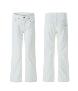 Detailed view of white wide-leg denim pants showing high waist cut and metal rivets
