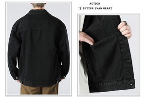 Detail of black denim jacket featuring reinforced back stitching and large inner pocket