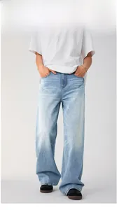 Full view of light blue wide-leg jeans with washed vintage finish and straight fit
